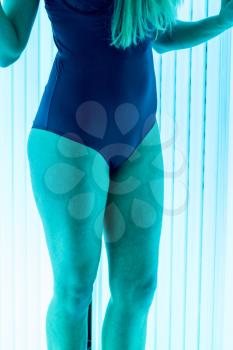 beautiful girl closeup in swimsuit at solarium
