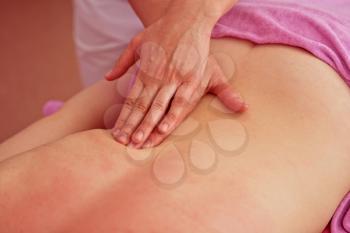 Woman having a massage at spa
