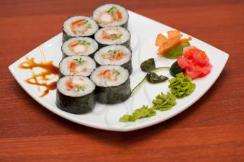 sushi rolls with crabs meat at plate