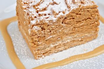 Cake Napoleon at plate closeup photo