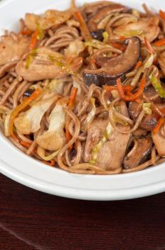 buckwheat noodles with chicken vegetables mushrooms and teriyaki sauce