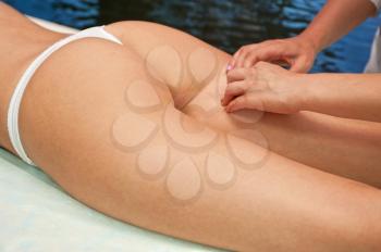 Legs and buttocks woman massage to reduce cellulite