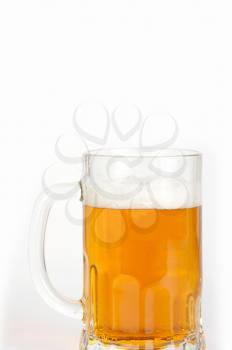 beer into glass on white background