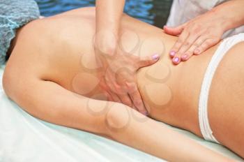 Woman having a massage at spa