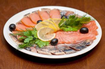 The set marinated mackerel, herring fillet, and salmon