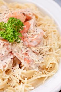Pasta with shrimp sauce and cheese