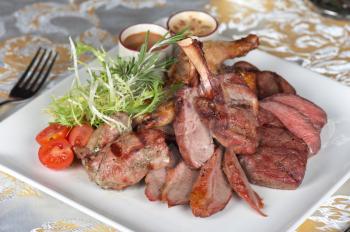 grilled meat with herbs and vegetables