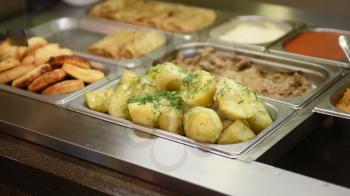 Boiled potato at eatery, closeup