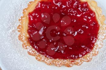 sweet cakes with berries jam closeup photo