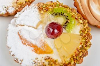 sweet cakes with fruits closeup photo