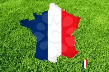 France map silhouette on green grass texture