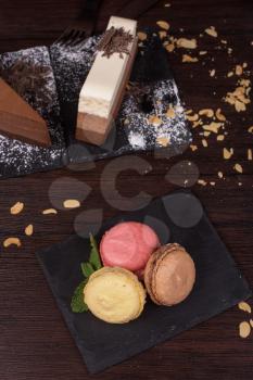 Table with cakes ans coffee cup