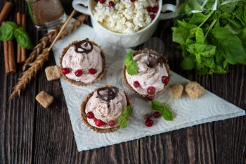 Homemade dessert from cottage cheese cream biscuit and berries