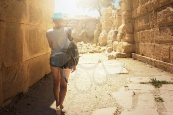 tourist woman at the ruins of ancient city Myra rock at Turkey Demre
