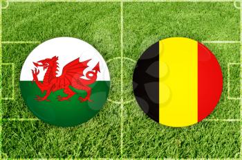 Wales vs Belgium icons at football field background