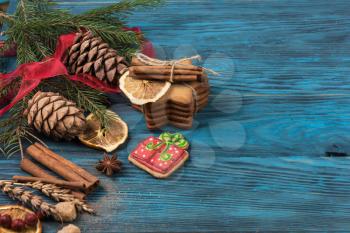 Different ginger cookies for new year holiday on wooden background, xmas theme