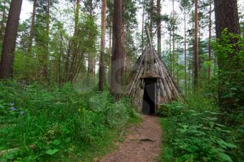 Old hovel of ancient altai people in the forest, Altai, Siberia, Russia
