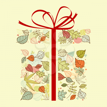 Autumnal gift with colorful leaves for seasonal design
