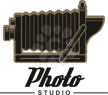 Photo studio symbol with retro folding camera. Unfolded vintage camera isolated icon with header Photo Studio below. Photographer emblem design