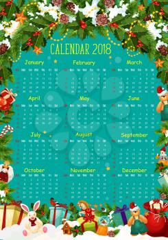 Calendar template with Christmas tree and holly berry branch frame. 2018 New Year calendar, bordered with Xmas holiday gift, star, snow and candy, ribbon bow, cookie and snowflake for Xmas design