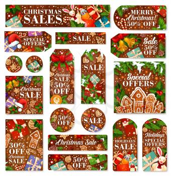Christmas sale tag and New Year holiday discount offer label. Xmas gift, pine tree and holly wreath with bell, star and snowflake, candy, ribbon, gingerbread cookie and ball on wooden background