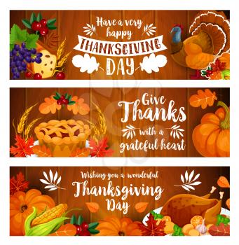 Thanksgiving greeting banner set with turkey and autumn harvest cornucopia on wooden background. Roasted turkey, pumpkin pie, corn vegetable and apple fruit with horn of plenty, fall leaf, grapes
