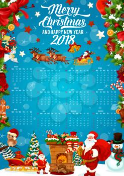 Festive calendar template of Christmas and New Year holiday celebration. Holly berry and Xmas tree frame of 2018 year calendar, adorned by Santa, snowman and snowflake, gift, candy, sock and cookie