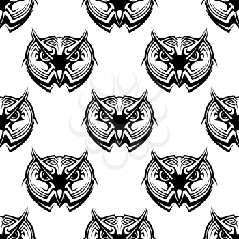 Black and white seamless repeat pattern of the heads of wise old horned owls