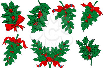 Christmas greens and holly berry branches with red ribbons for seasonal holiday design