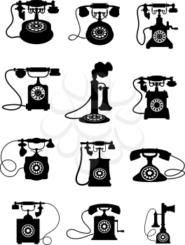 Black and white silhouettes of  vintage telephones isolated on white background