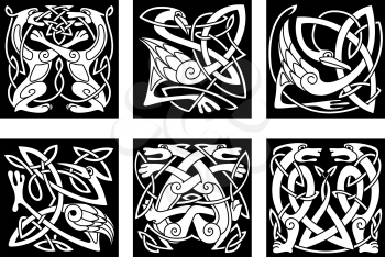 Set of stylish intricate stylized birds and animals in an intertwined form in white silhouettes on black in square format