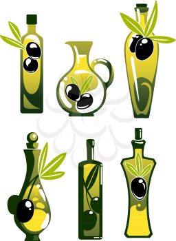 Extra virgin olive oil in glass bottles and jugs, decorated by twigs with black fruits and leaves, for healthy vegetarian food