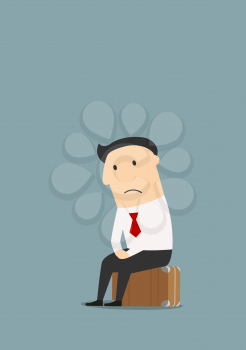 Depressed fired cartoon businessman sitting on a suitcase after dismissal. Unemployment theme concept