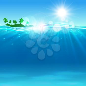 Tropical island with palms at the ocean in sunny summer day with sun spots and sunbeams on blue waves. Seascape background for vacation and travel design