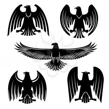 Black eagle, hawk or falcon heraldic symbol set. Flying and standing wild birds silhouettes with open wings. Sporting mascot, tribal tattoo, coat of arms design