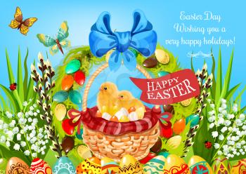 Easter egg hunt basket with chickens greeting card. Yellow chicks with coloured eggs in wicker basket, adorned with ribbon, bow, lily flower, floral Easter wreath, green grass, butterfly, willow twigs