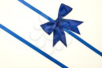 Royalty Free Photo of a Blue Ribbon Bow