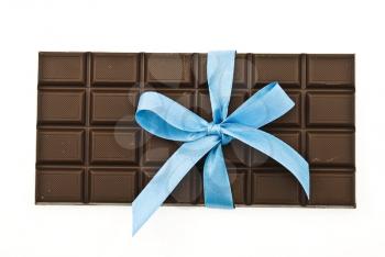 Black chocolate with blue ribbon and bow 