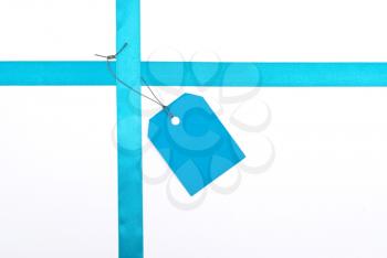 Royalty Free Photo of Blue Ribbon With a Tag