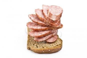 Royalty Free Photo of Sliced Sausage on Bread