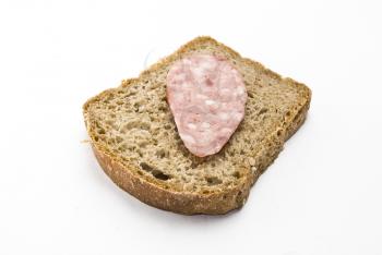 Bread and sliced sausage 
