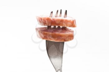 Royalty Free Photo of Sausage on a Fork