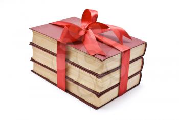 Royalty Free Photo of a Pile of Books Wrapped in a Bow