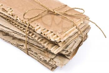 Royalty Free Photo of a Pile of Tied Cardboard