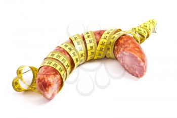 Royalty Free Photo of a Sausage With Measuring Tape