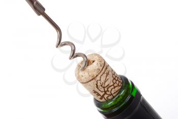Royalty Free Photo of a Corkscrew Opening a Wine Bottle