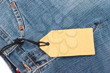 Royalty Free Photo of a Price Tag on Jeans