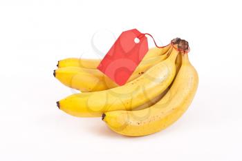Royalty Free Photo of a Bunch of Bananas With a Tag