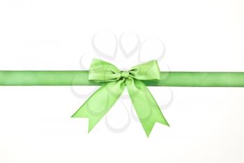 Royalty Free Photo of a Green Gift Satin Ribbon and Bow