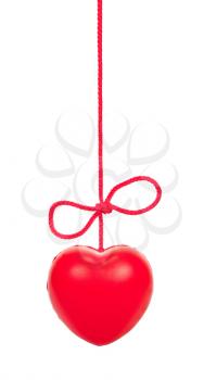 Royalty Free Photo of a Red Heart Icon Hanging on a Red String